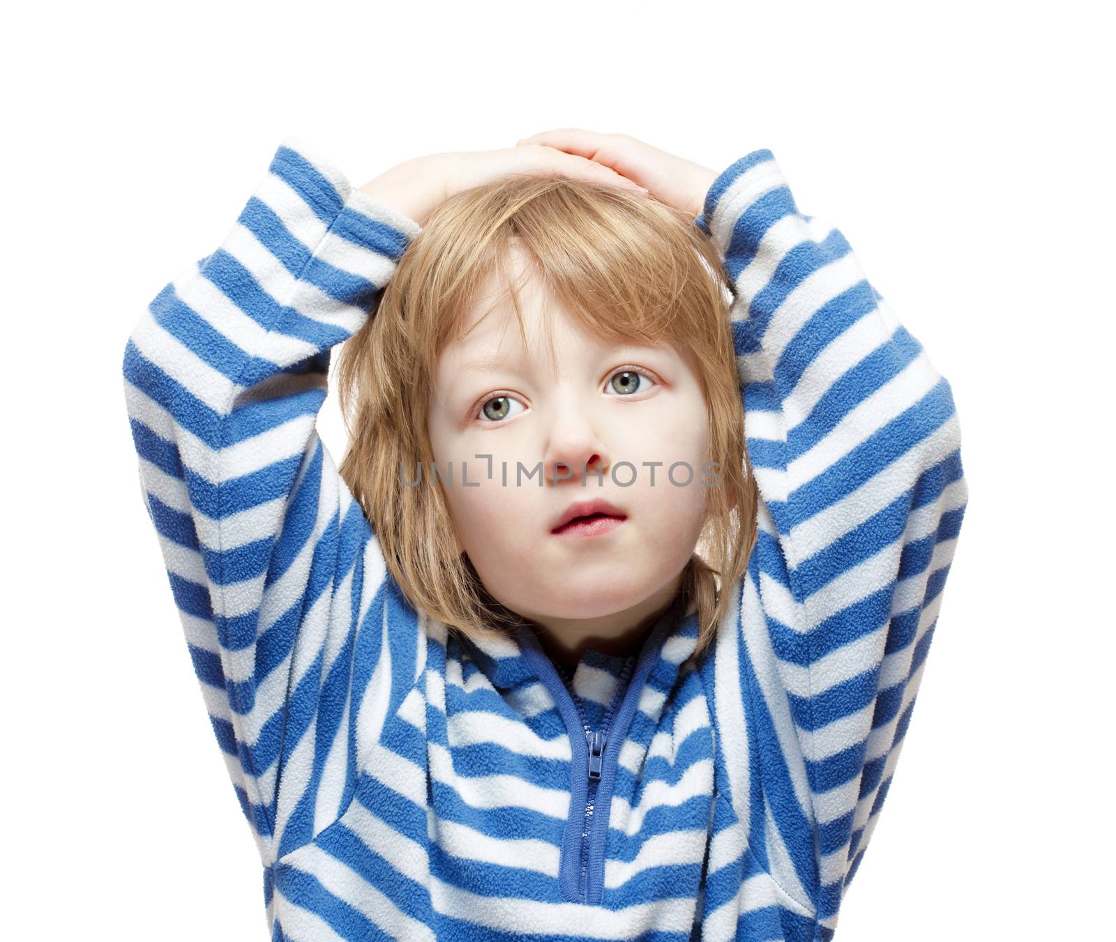 studio portrait of a boy with long blond hair - isolated on white