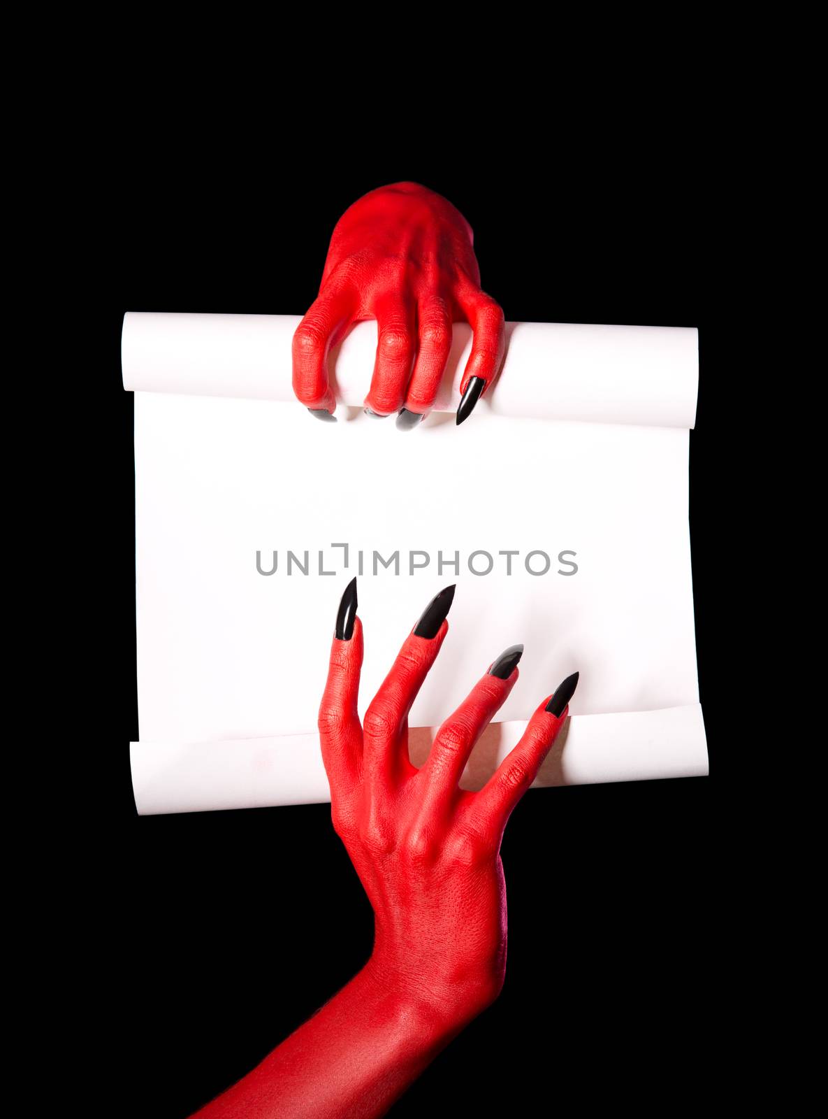 Red devil hands holding blank paper scroll, deal with devil concept for Halloween 