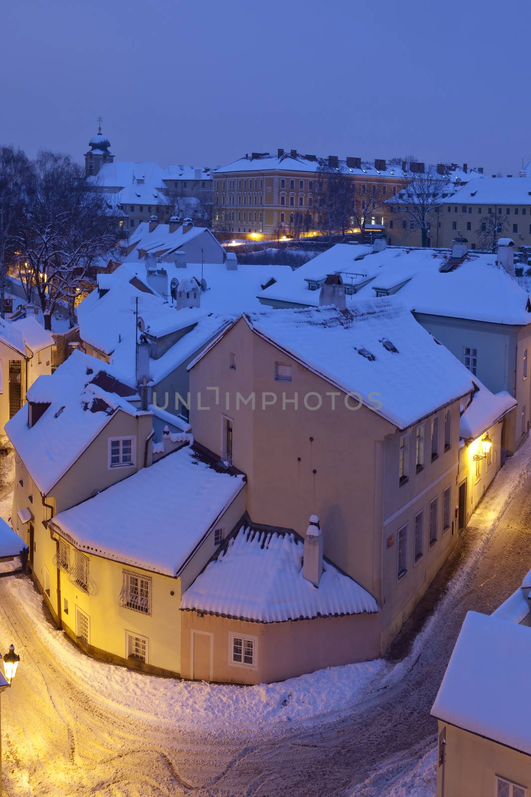 new world - picturesque quarters near hradcany castle at dusk