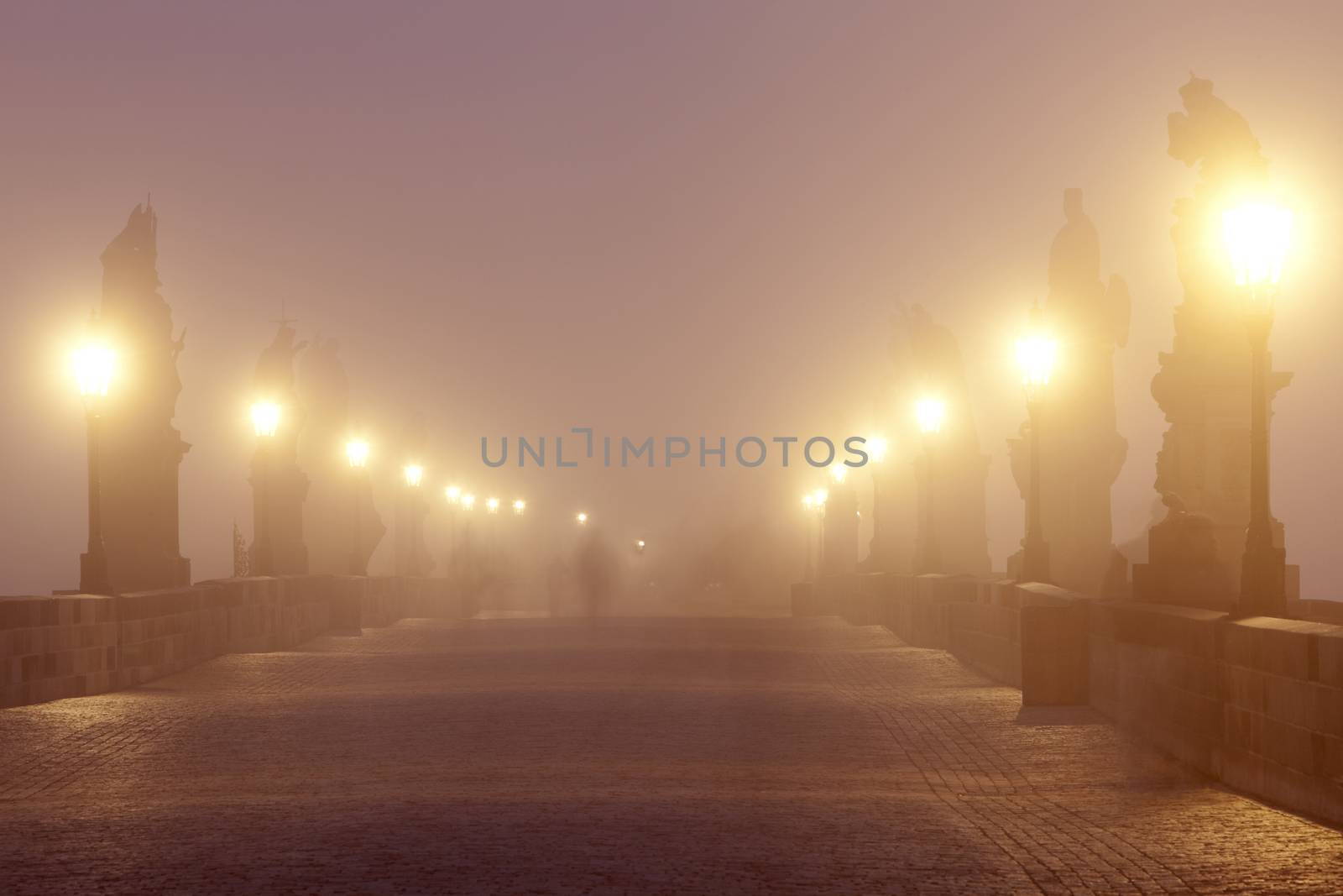 czech republic prague - charles bridge on foggy morning