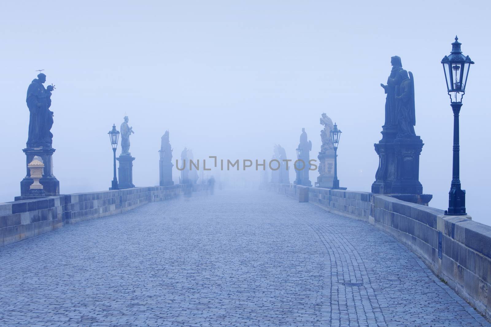 czech republic prague - charles bridge on foggy morning