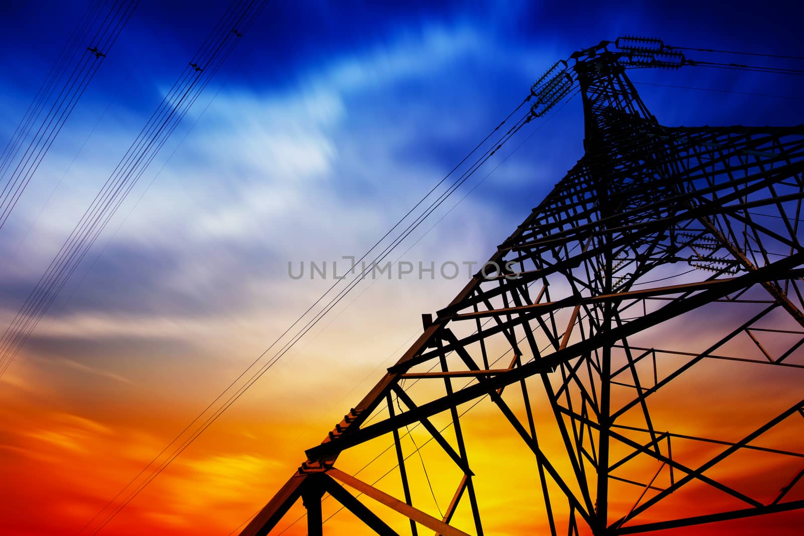 High voltage tower at sunset by long8614