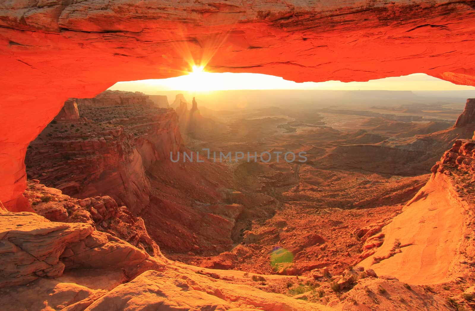 Glowing Mesa Arch at sunrise, Canyonlands National Park, Utah