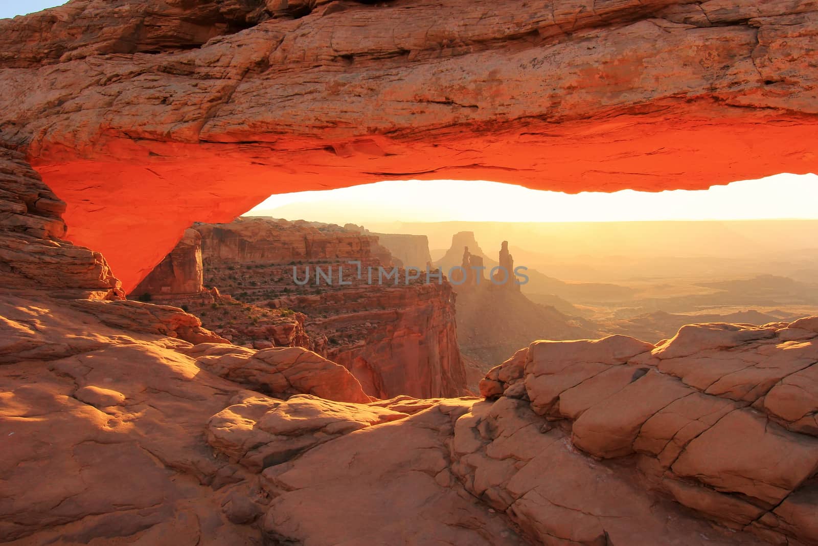 Glowing Mesa Arch at sunrise, Canyonlands National Park, Utah, U by donya_nedomam