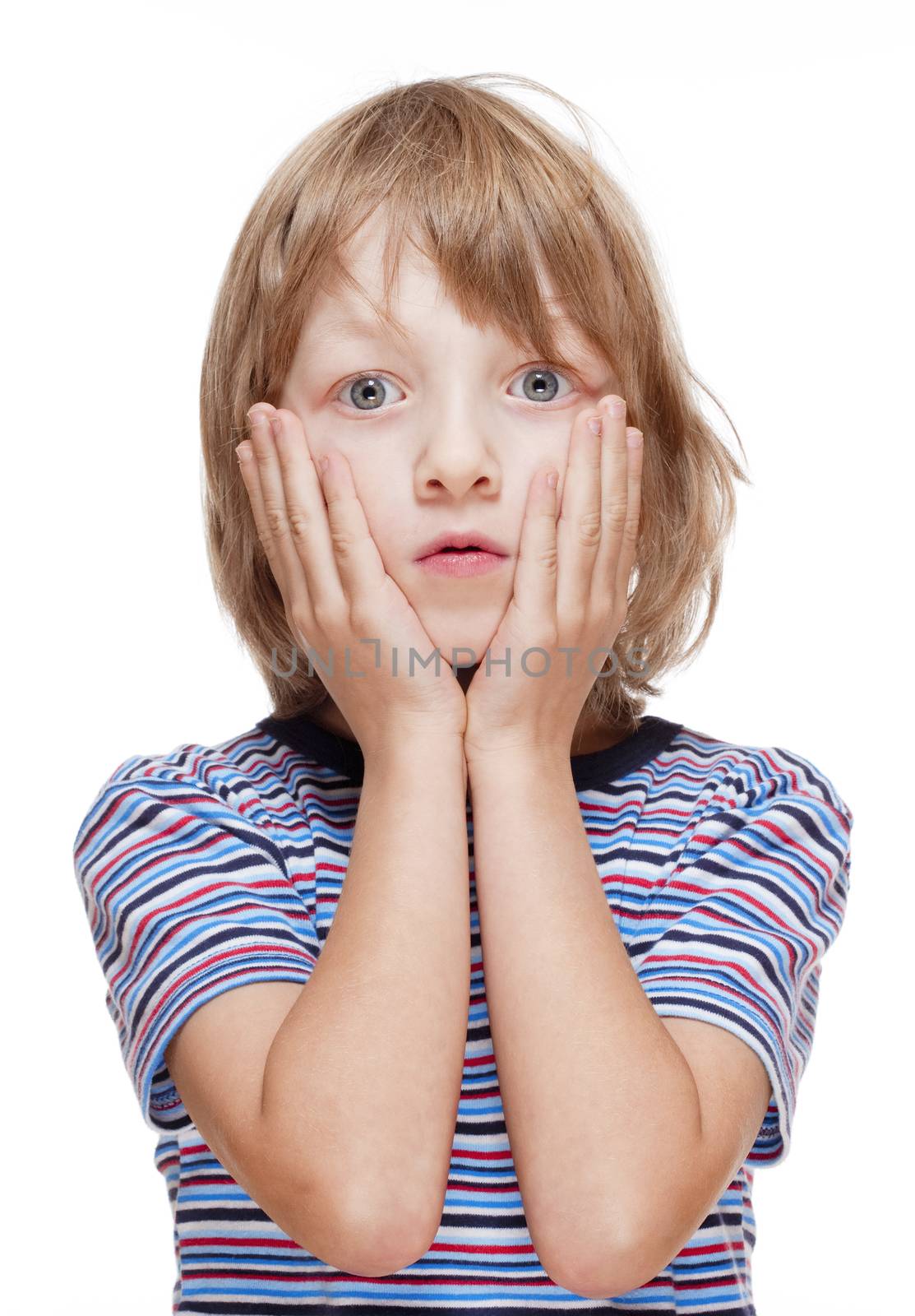 Boy with Blond Hair Suprised, Hands on his Cheeks - Isolated on White