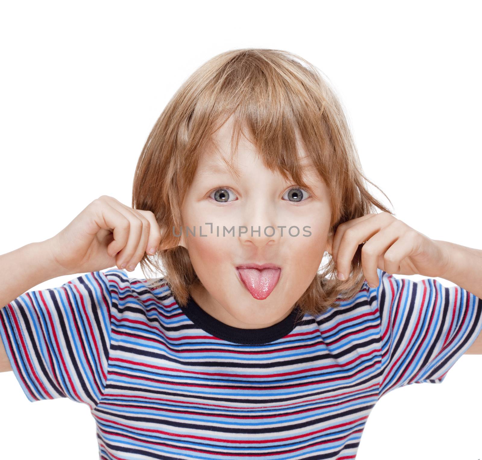 boy with long blond hair sticking out his tongue - isolated on white