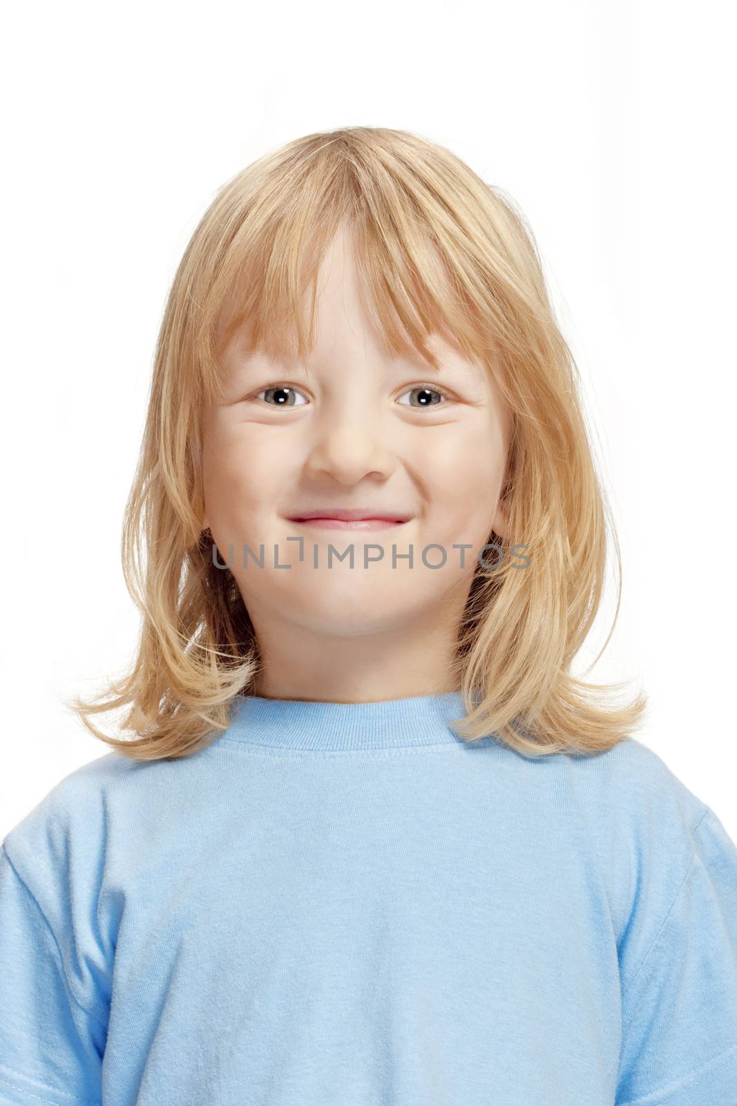 portrait of a boy with long blond hair smiling - isolated on white