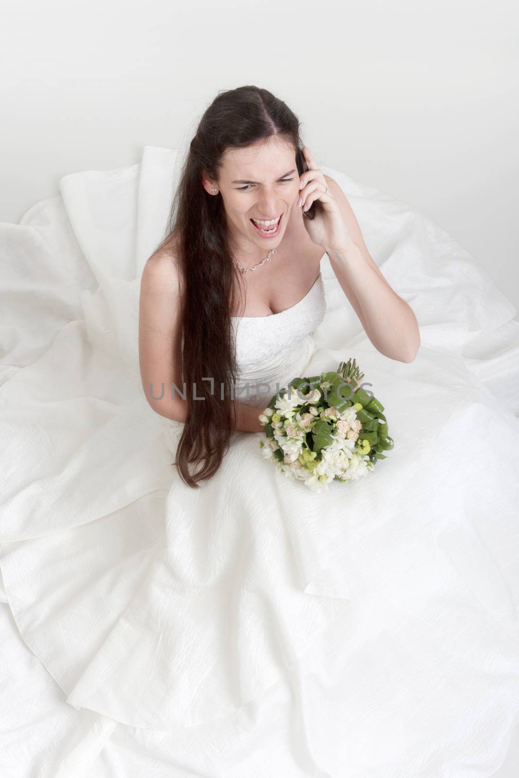 angry bride on cell phone by courtyardpix