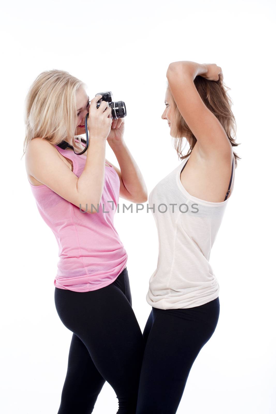 young women taking pictures by courtyardpix