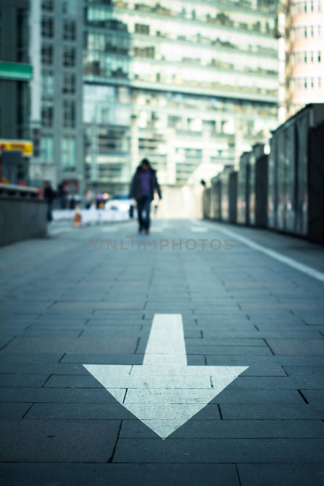 arrow on the road in city
