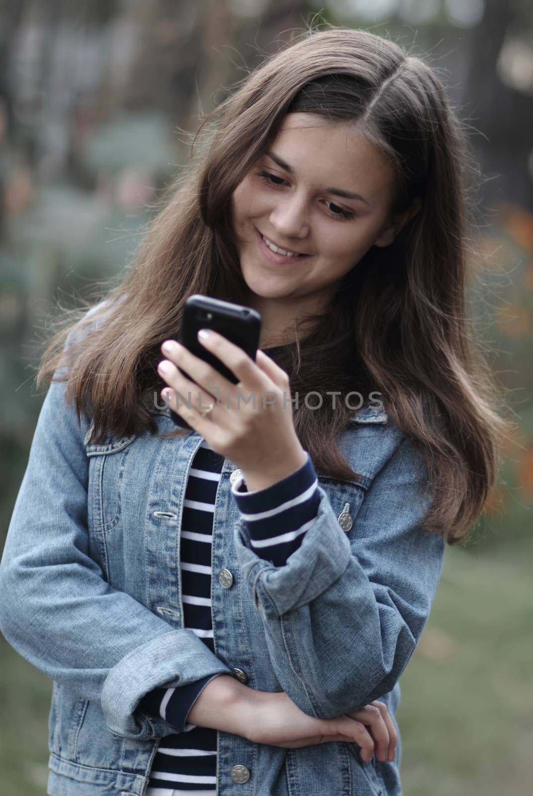 happy beautiful girl talking on the phone