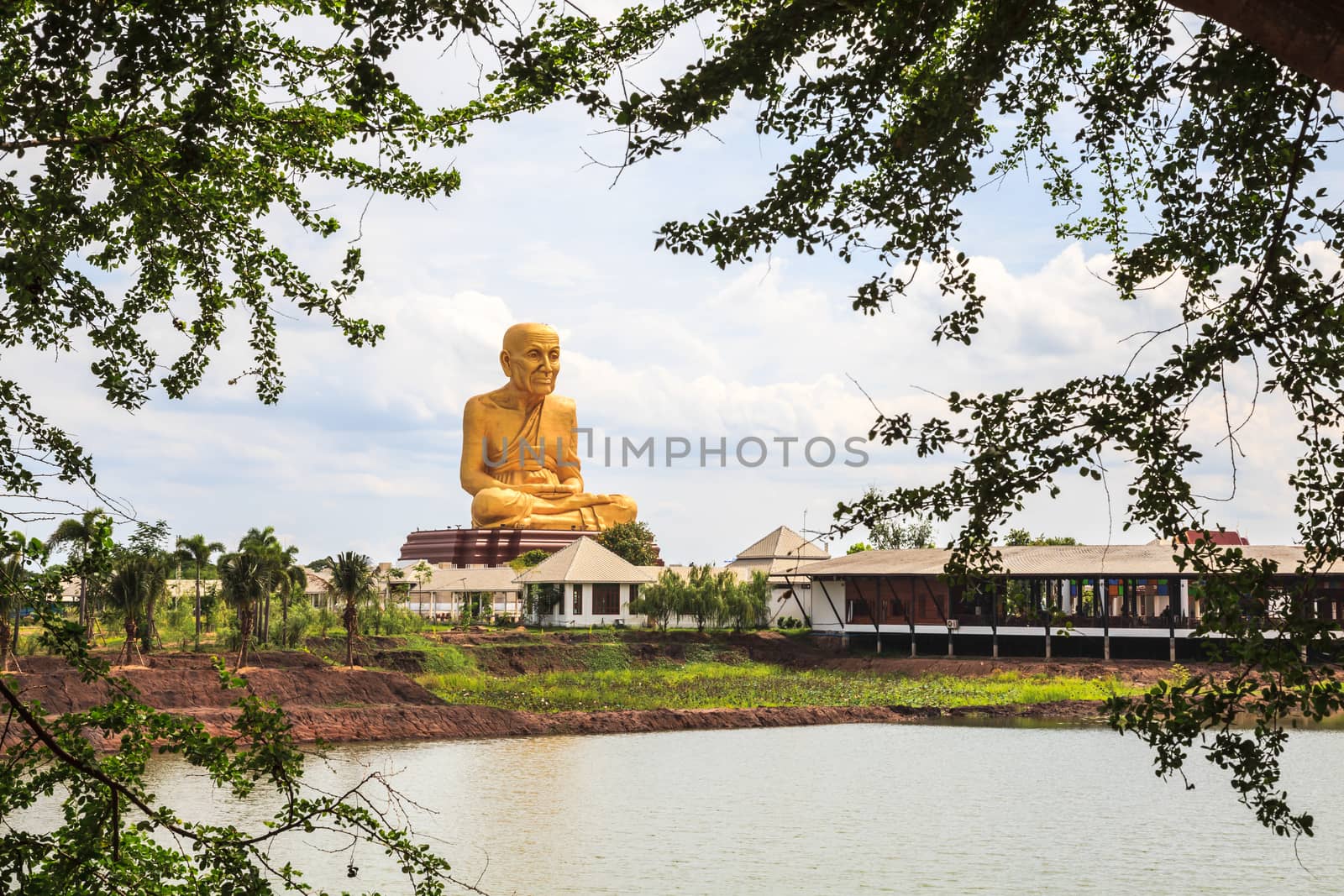 Giant statue of famous thai monk located in ayutthaya province, near the highway to northern thailand.