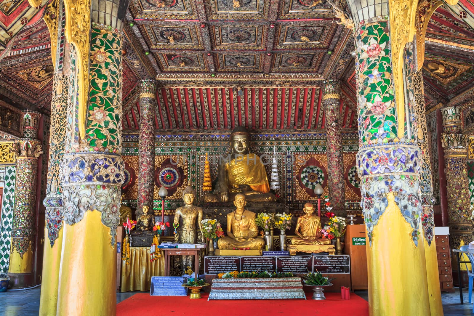 Buddha image and decoration in the Viharn of famous temple in Lampang Province, Thailand