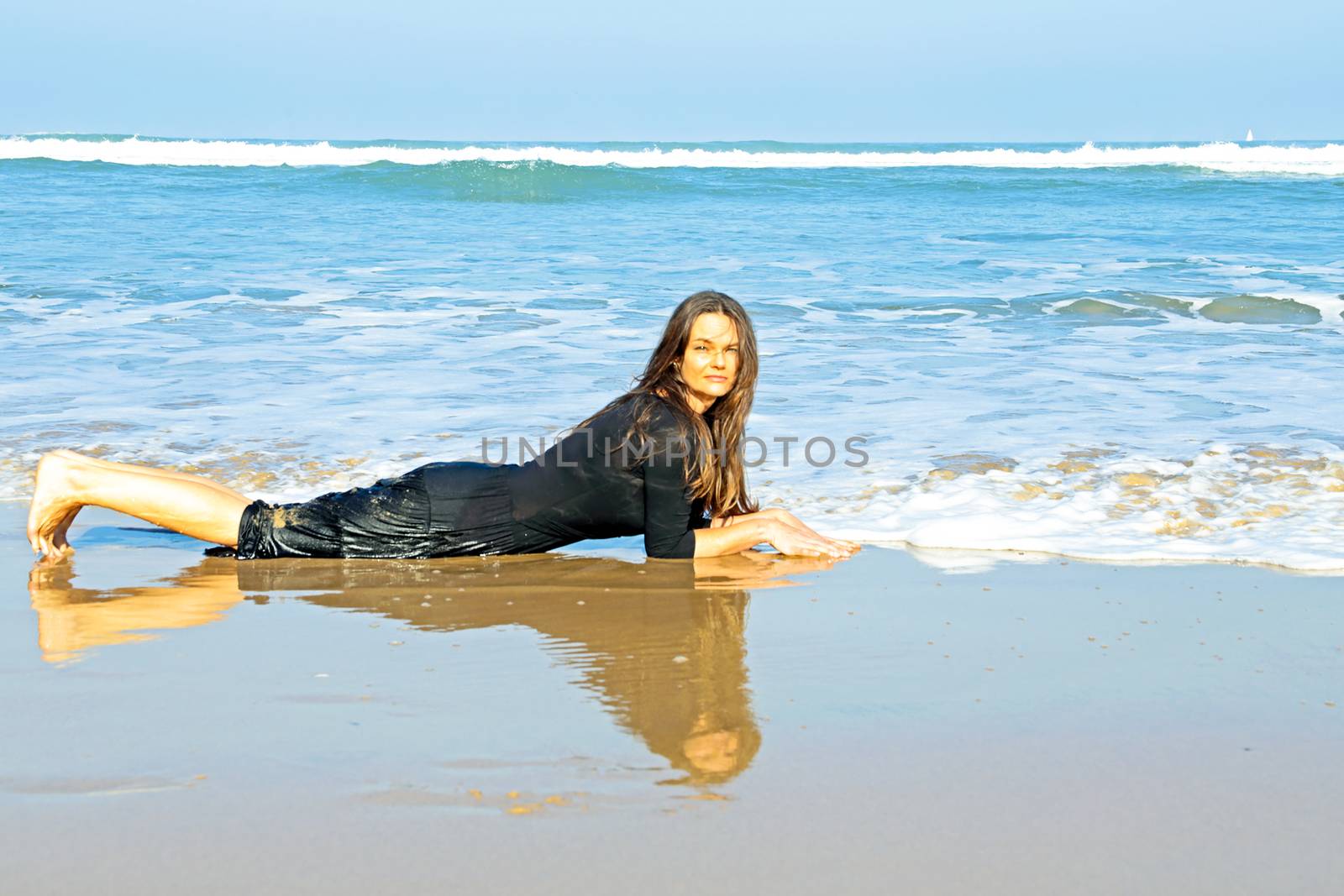 Beautiful woman in the water from the ocean