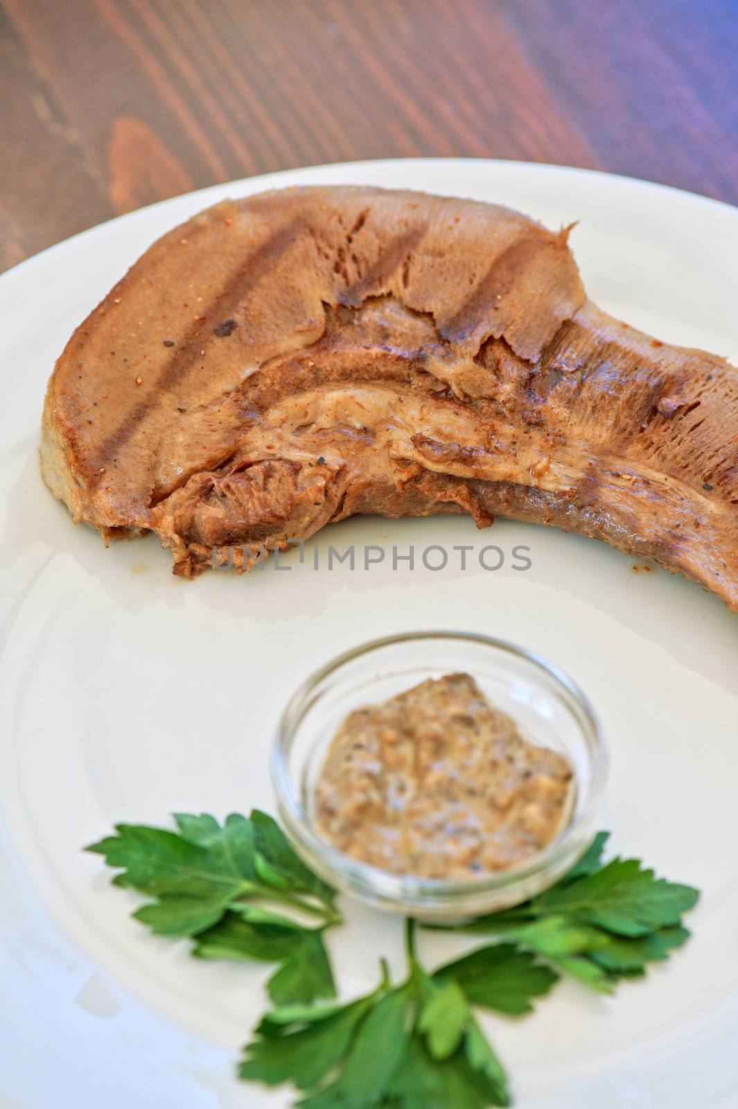 Boiled beef tongue with sauce