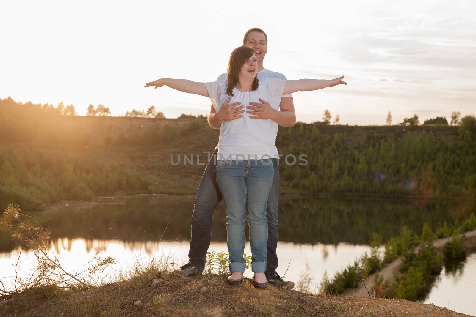 Young couple is having a romantic time in nature