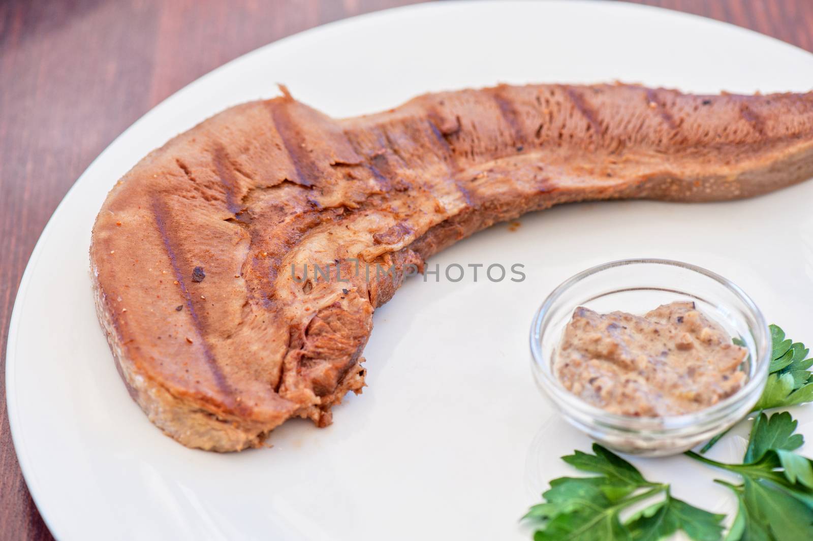 Boiled beef tongue with sauce