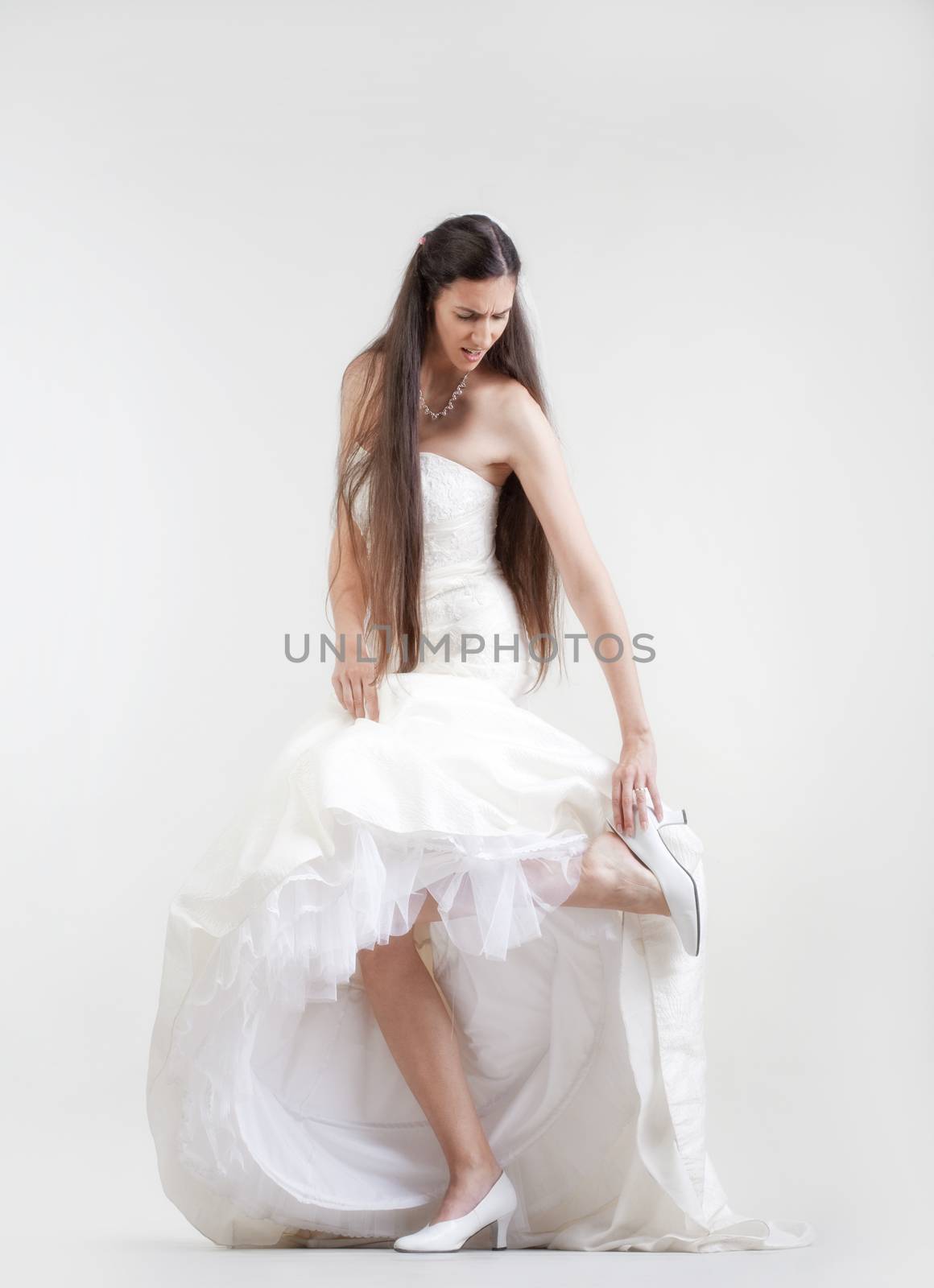 bride in wedding dress by courtyardpix