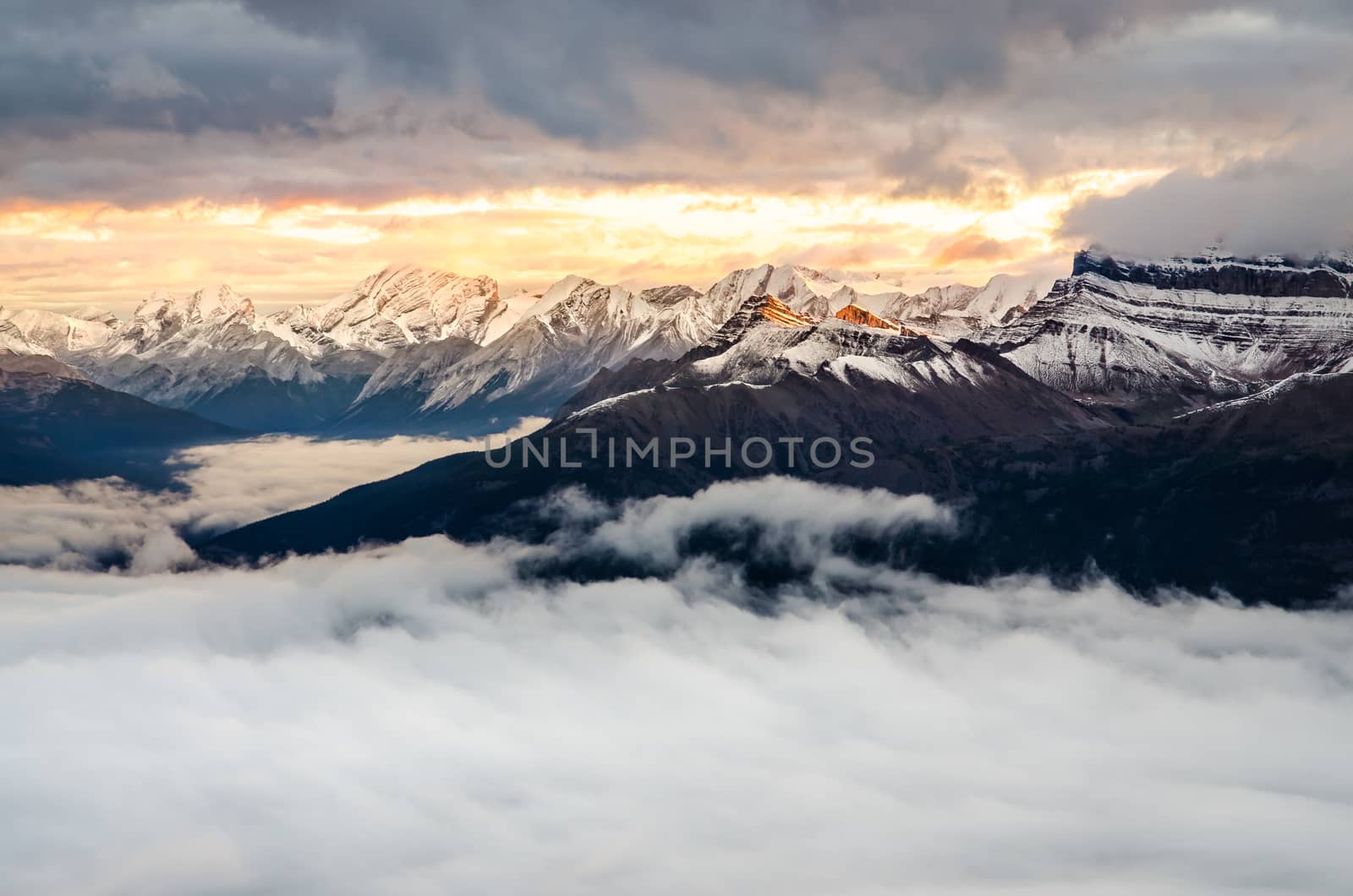 Colorful sunrise with winter mountain range, Banff, Canada by martinm303