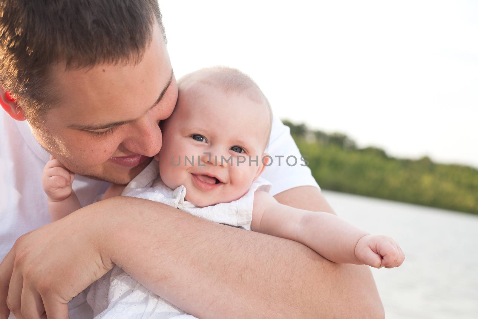 Happy father and baby by DNFStyle