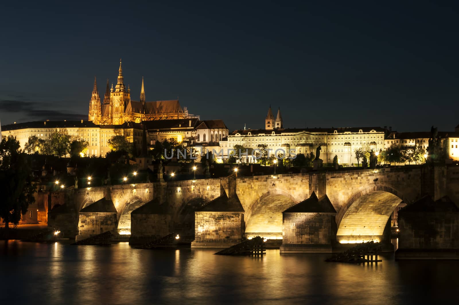 St. Vitus Cathedral and Charles bridge at night, Prague, Czech Republic.