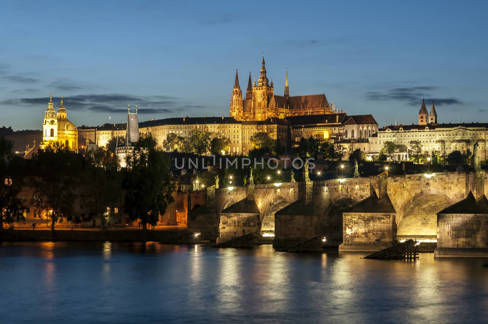 St. Vitus Cathedral and Charles bridge at night, Prague, Czech Republic.