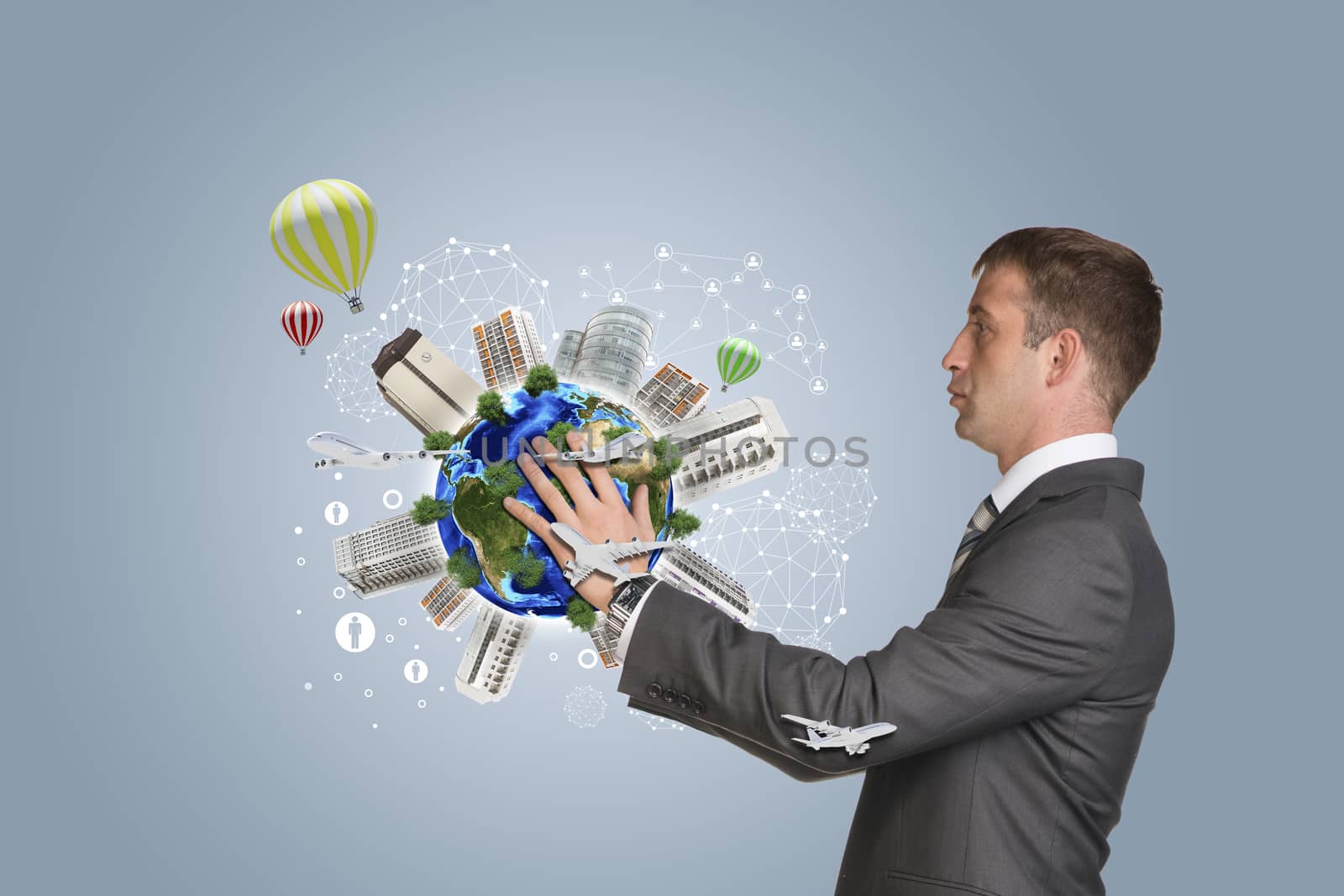 Businessman in suit hold Earth with buildings. Elements of this image are furnished by NASA