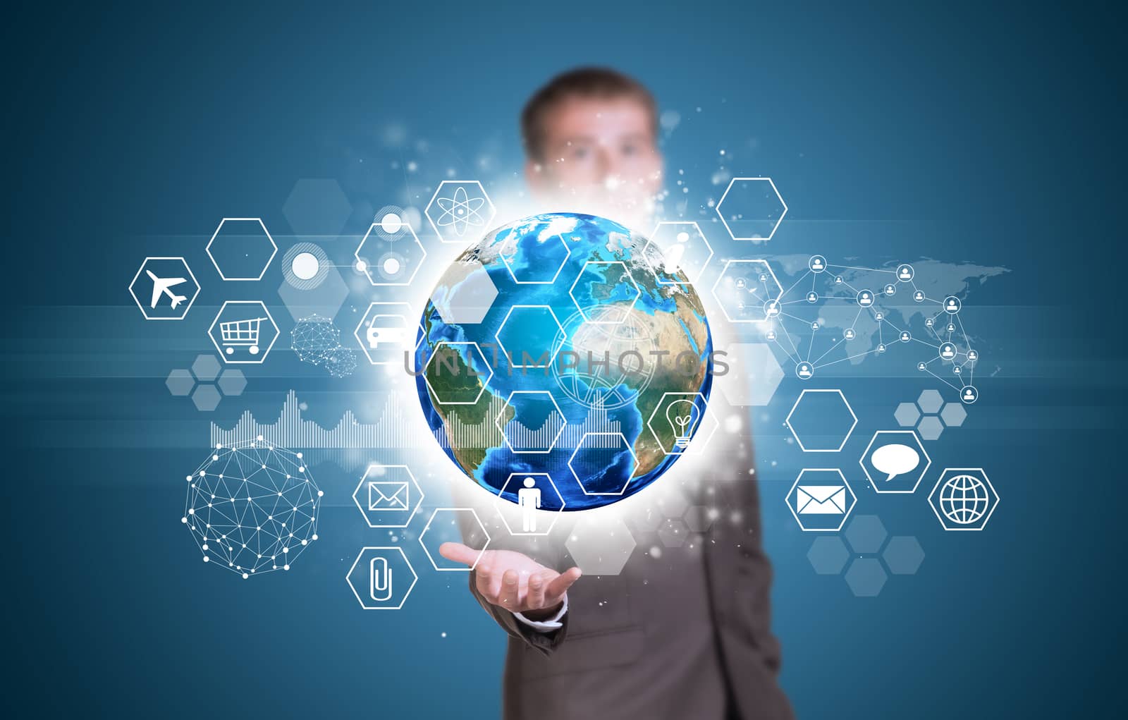 Businessman in suit hold Earth with graphs, hexagons, icons and network. Elements of this image are furnished by NASA