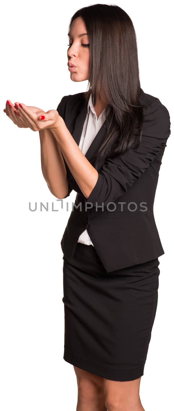 Beautiful businesswoman blowing in empty hands. Isolated on white background