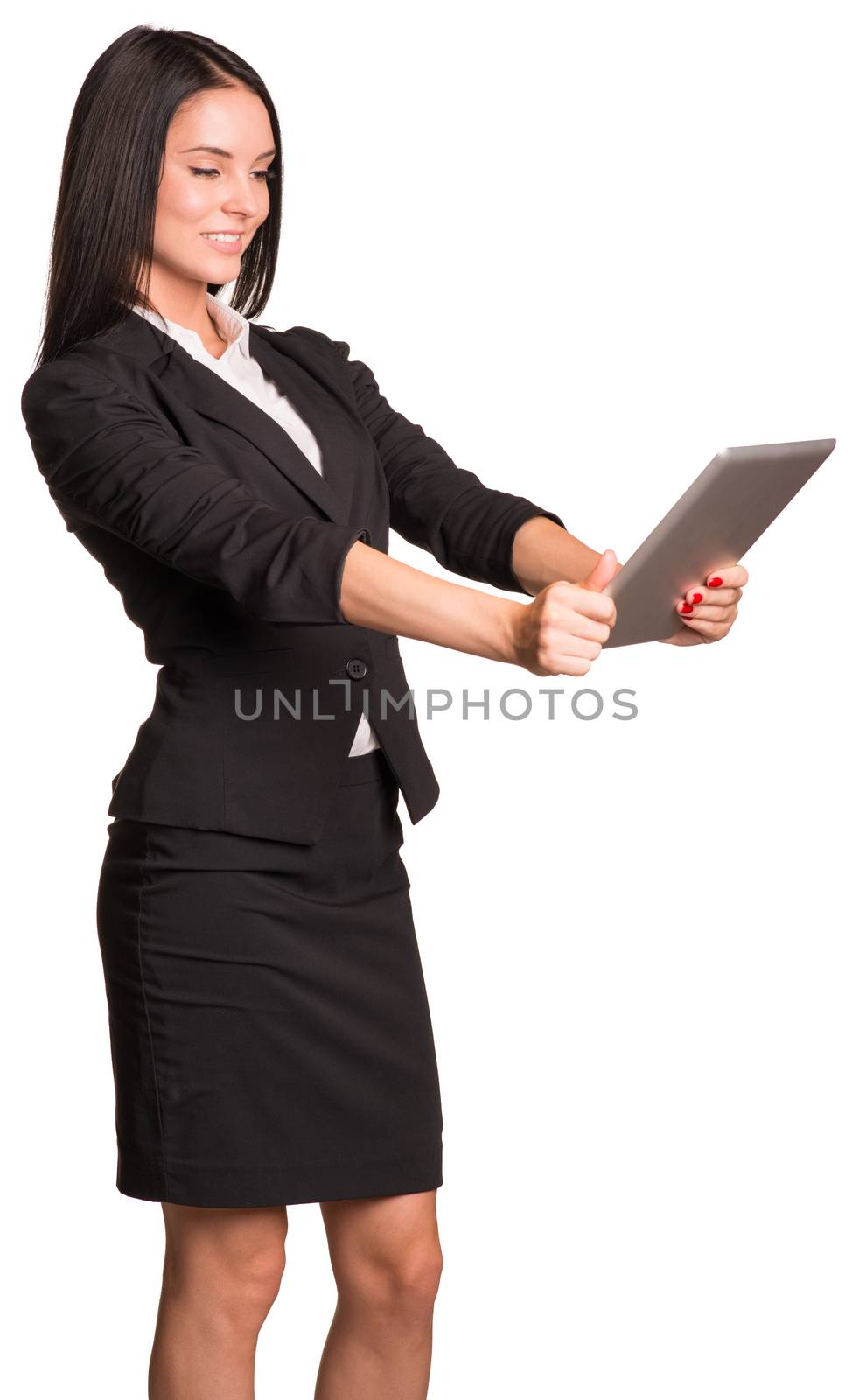 Beautiful businesswoman in suit photographs herself using the tablet. Isolated on white background