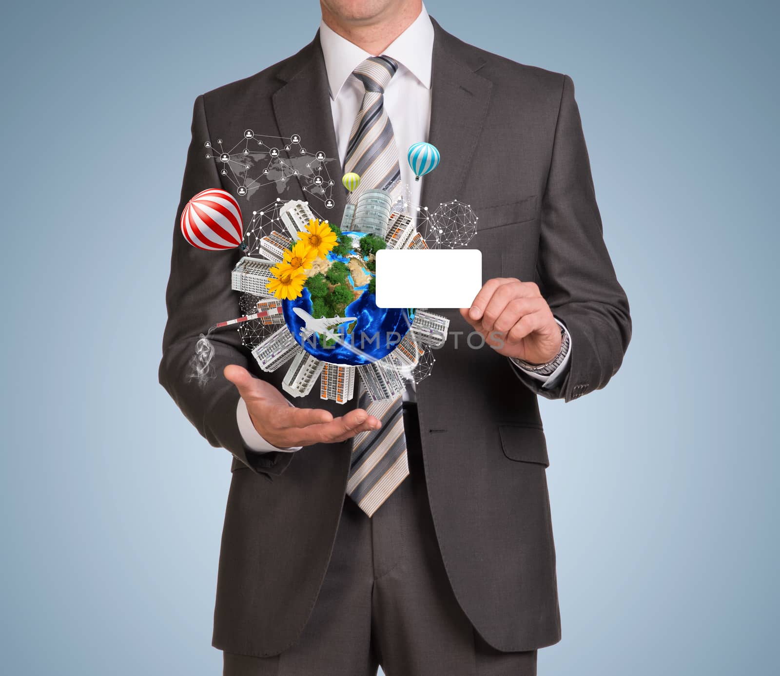 Businessman in suit hold empty card and Earth with buildings. Elements of this image are furnished by NASA