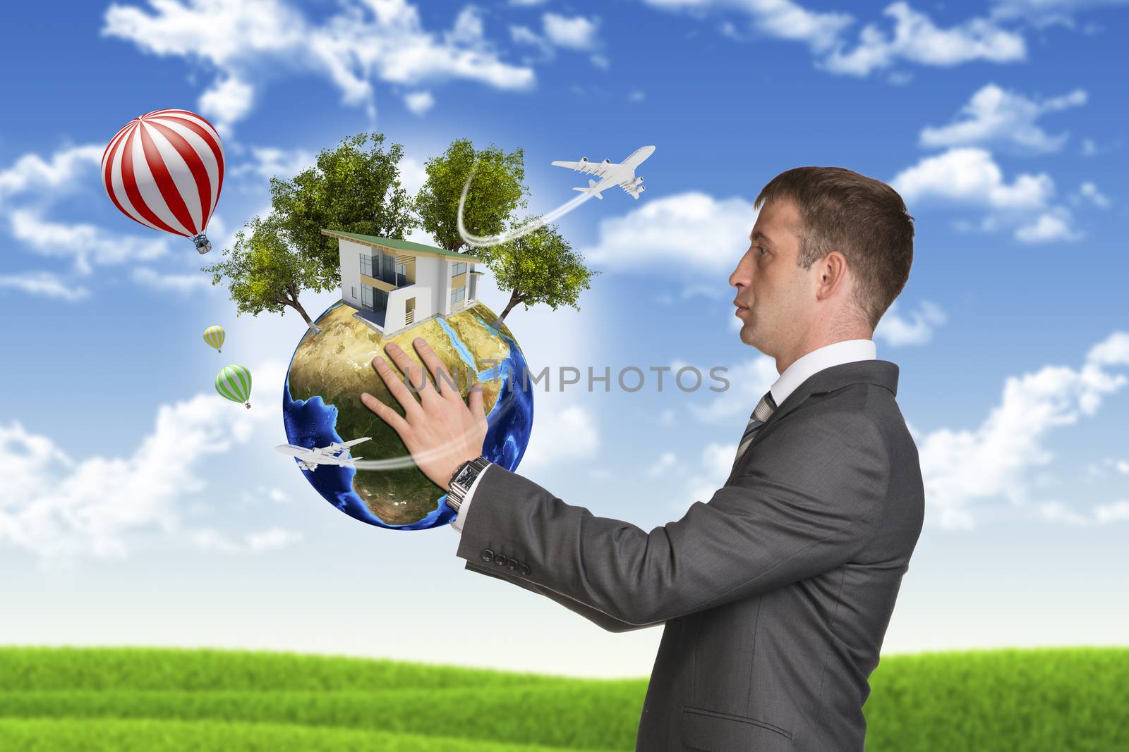 Businessman hold Earth with small house and trees. Nature landscape as backdrop. Elements of this image are furnished by NASA