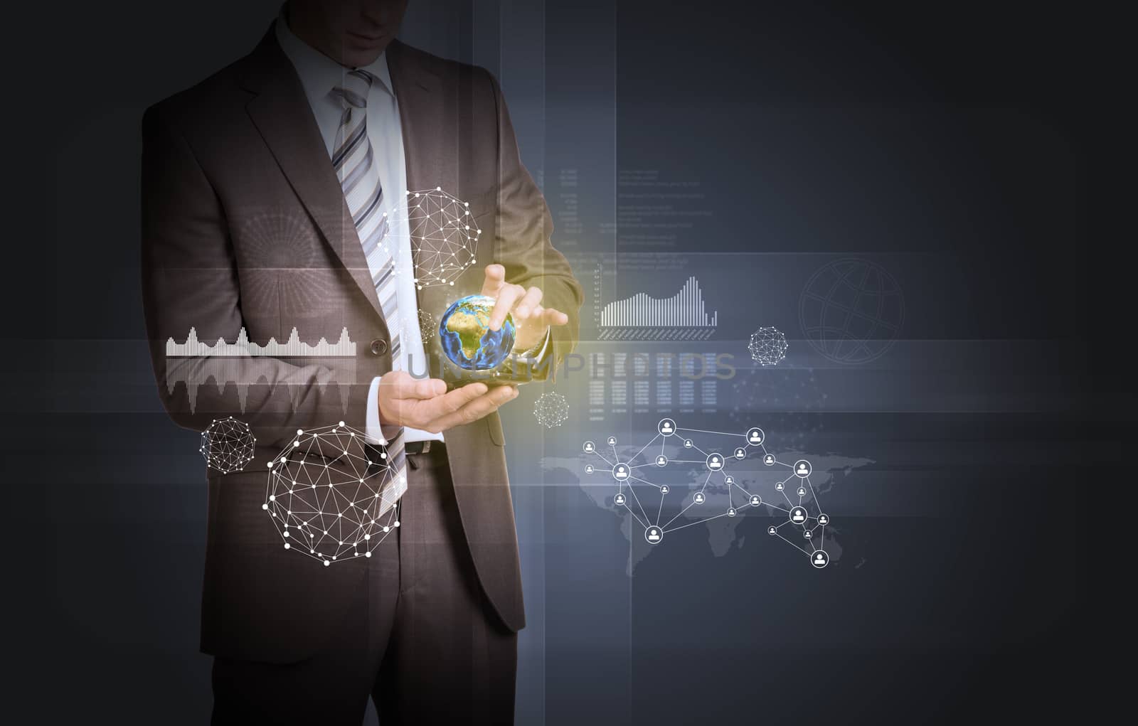 Businessman in suit hold Earth with graphs and network by cherezoff