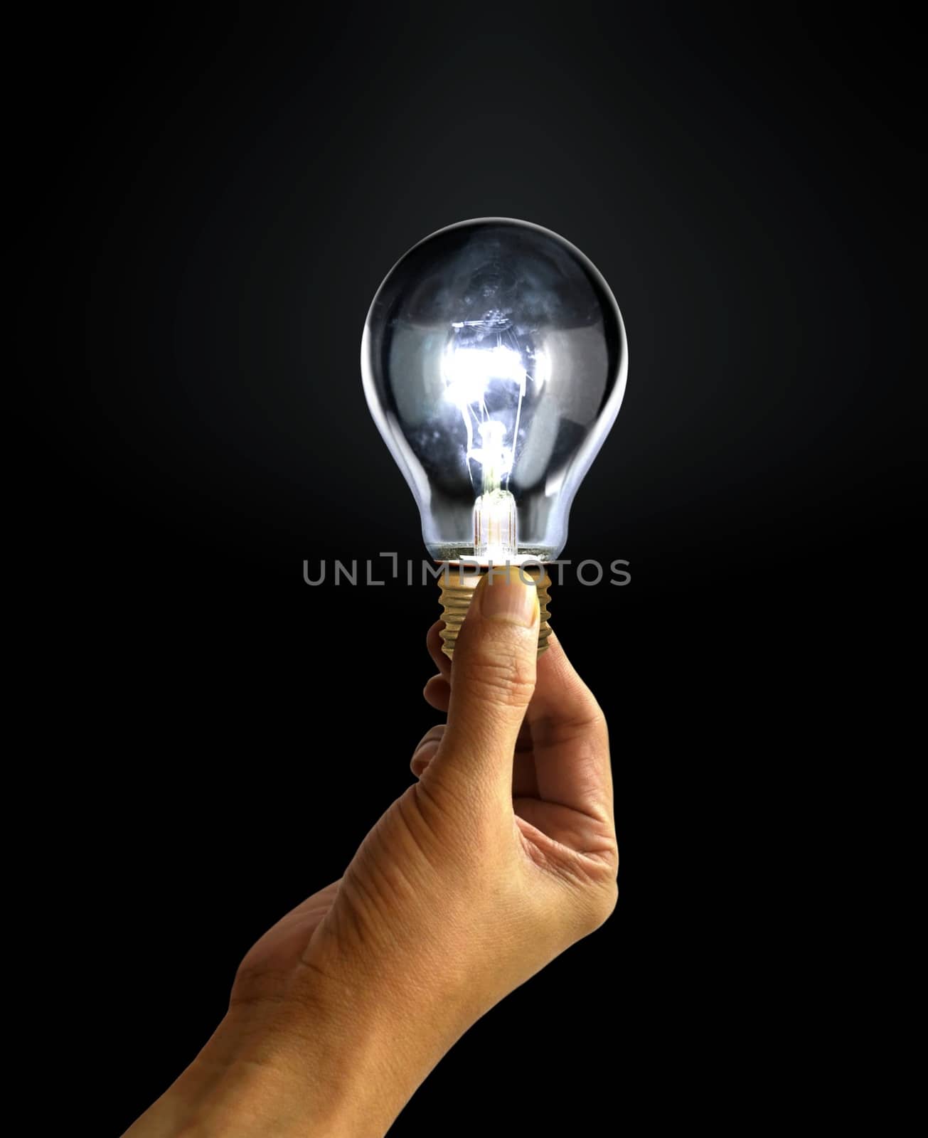 Hand Holding Light Bulb by razihusin