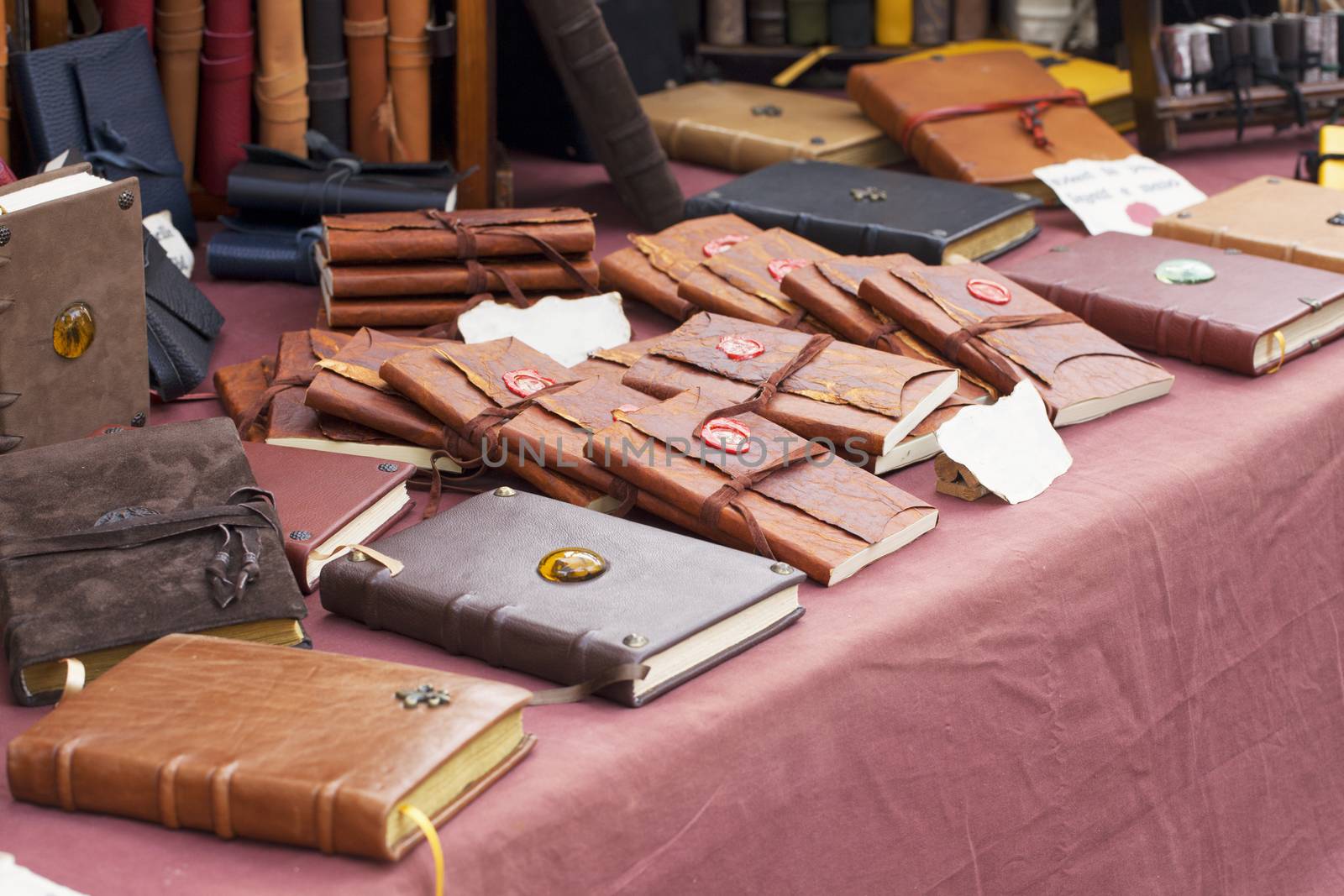 Ancient notebooks in leather over a table