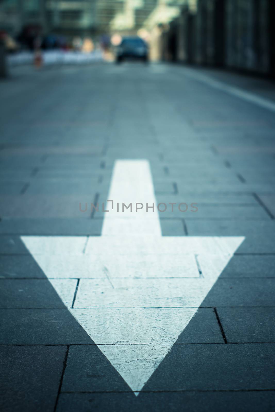 arrow on the road in city