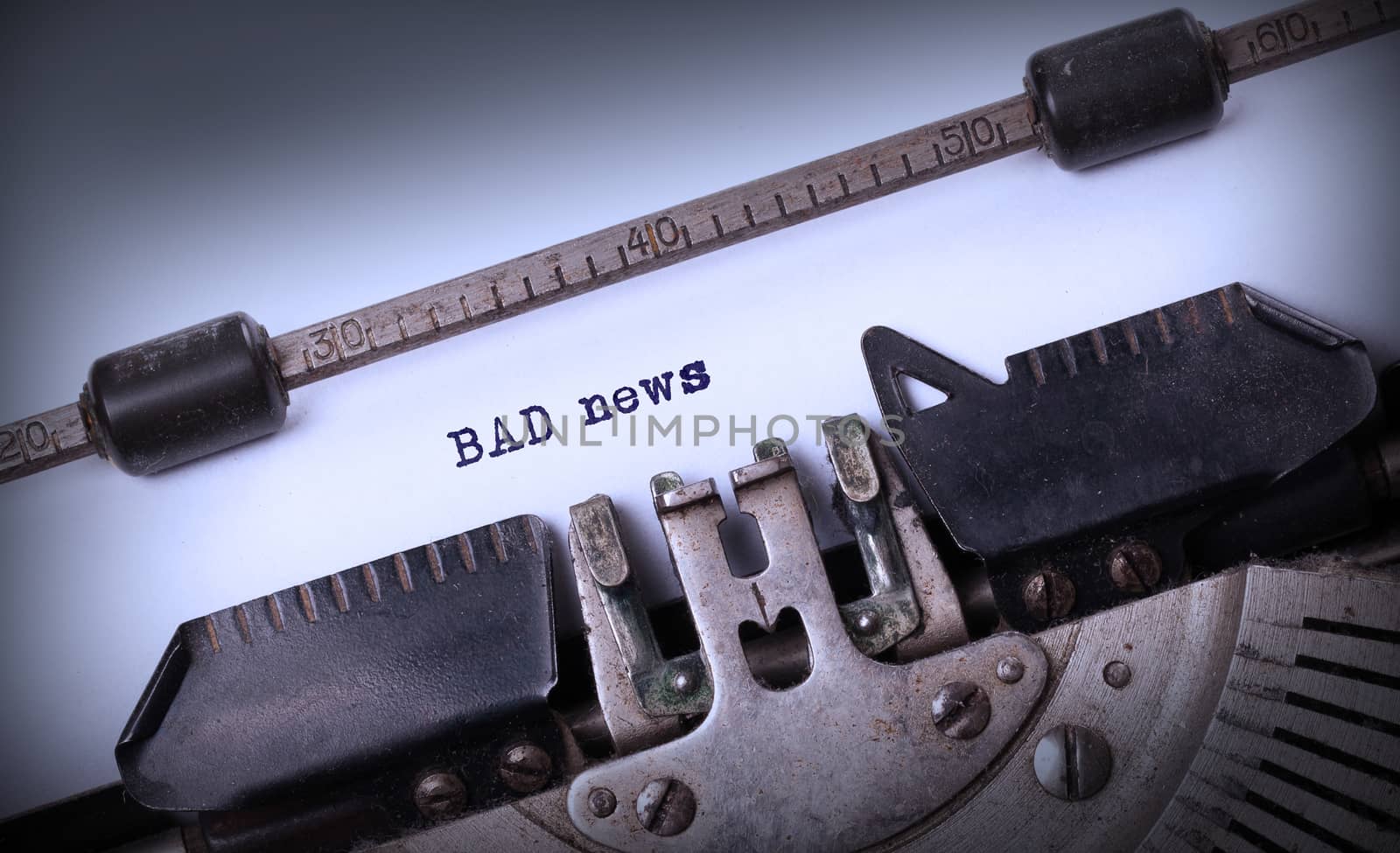 Vintage inscription made by old typewriter, Bad news