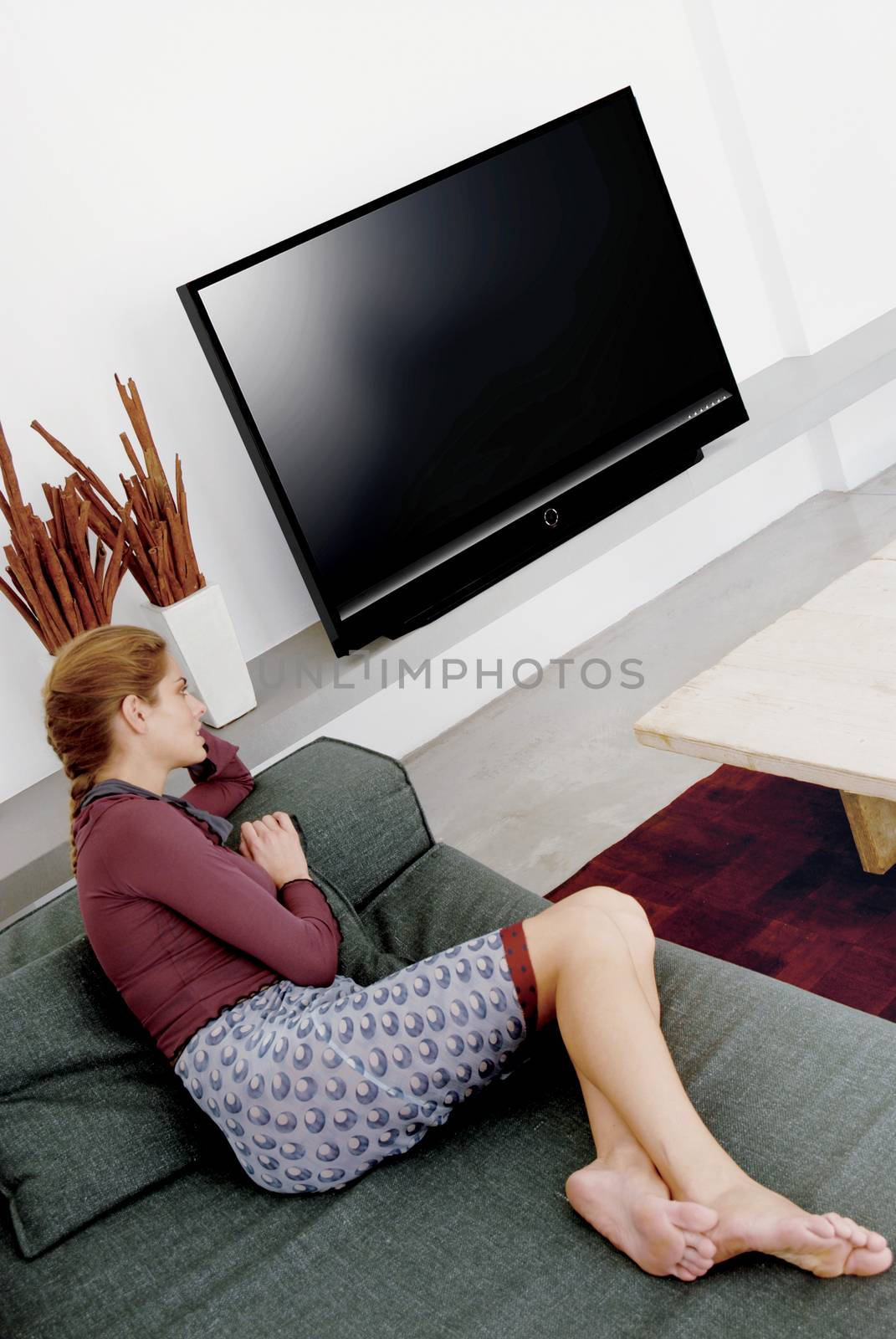 woman watching television a by toocan