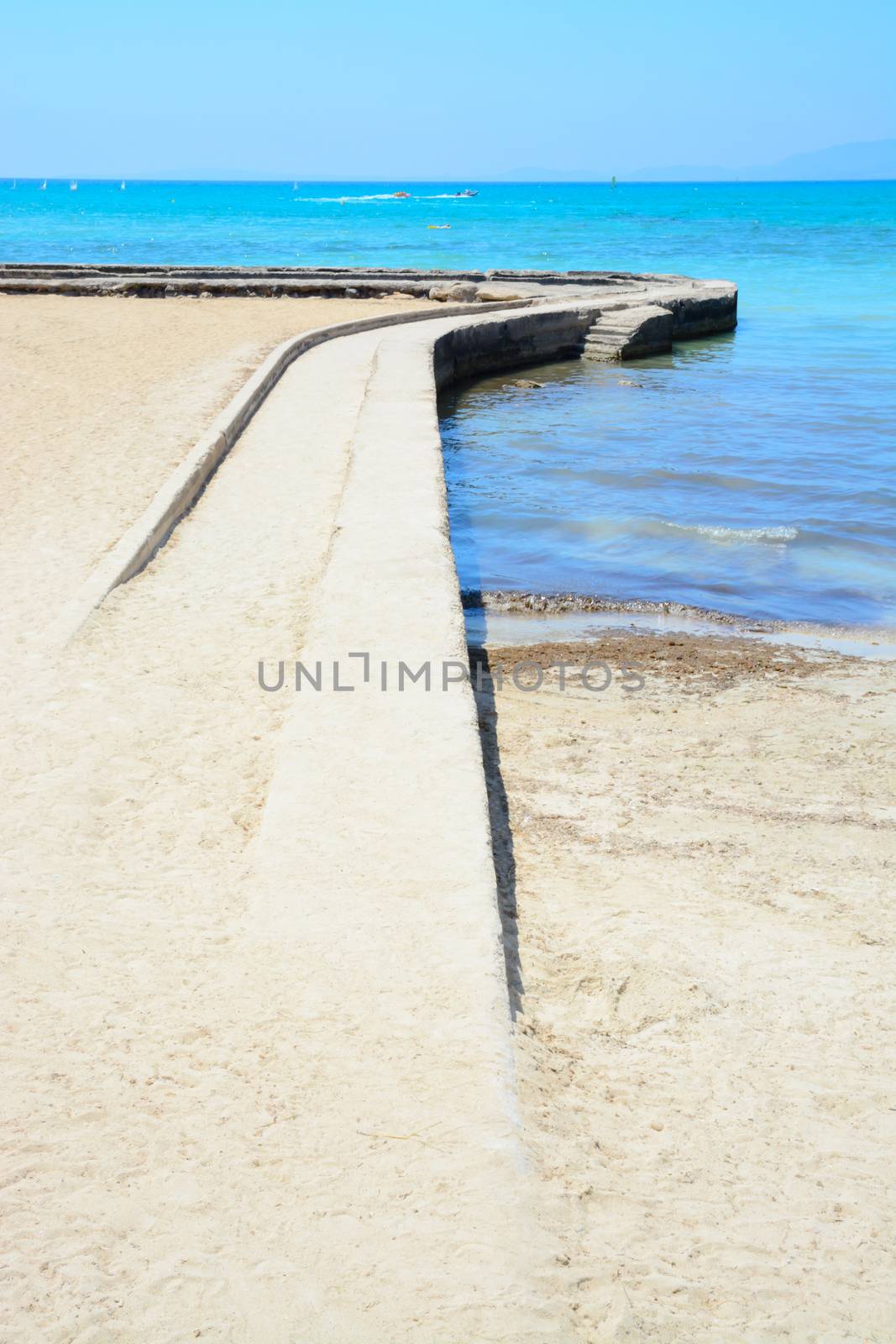 Stone jetty horizon Palma bay, Mallorca, Balearic islands, Spain.