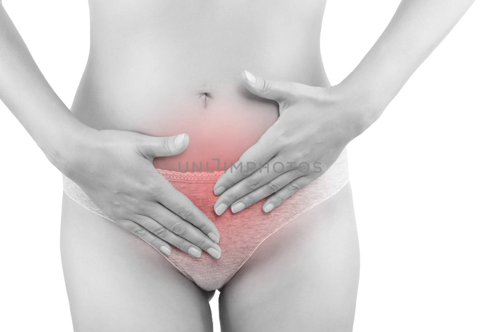 Beautiful woman touching her belly in grey panties isolated on white background. Menstruation, period, pregnancy. Feminine health problems.