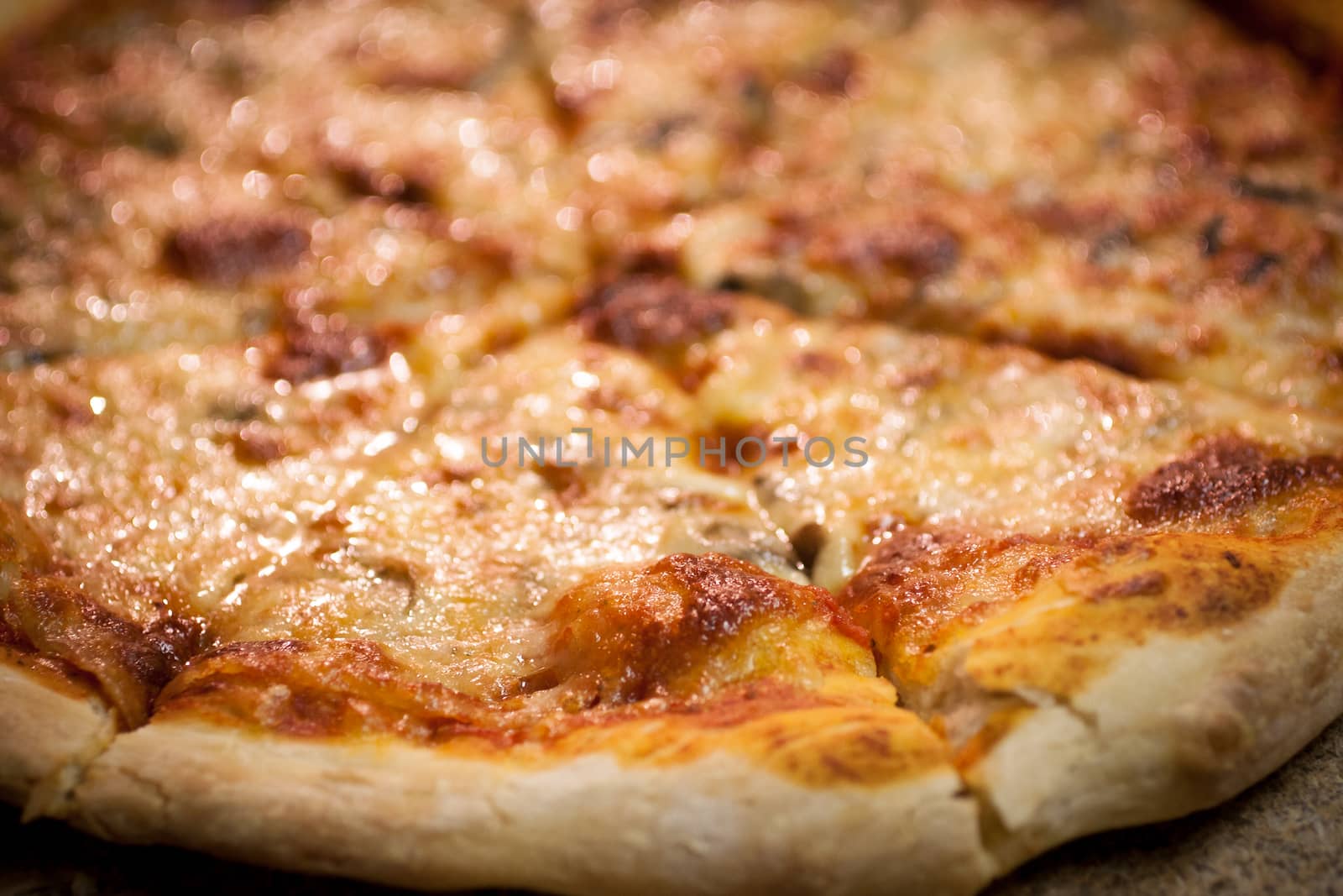 A freshly baked pizza, ready to searve.