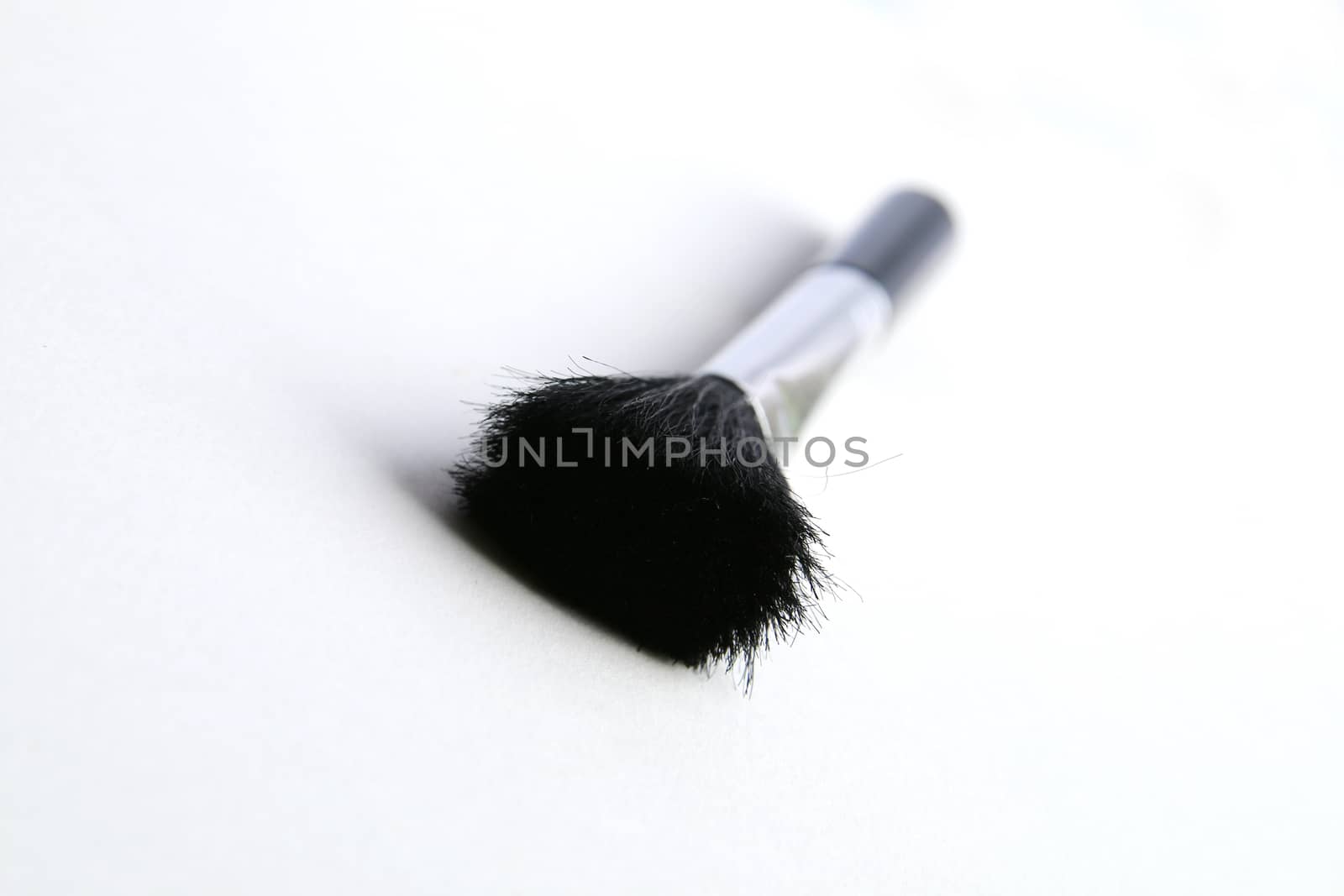 The black brush have metal handle.Use for cleaning cleaning appliance.