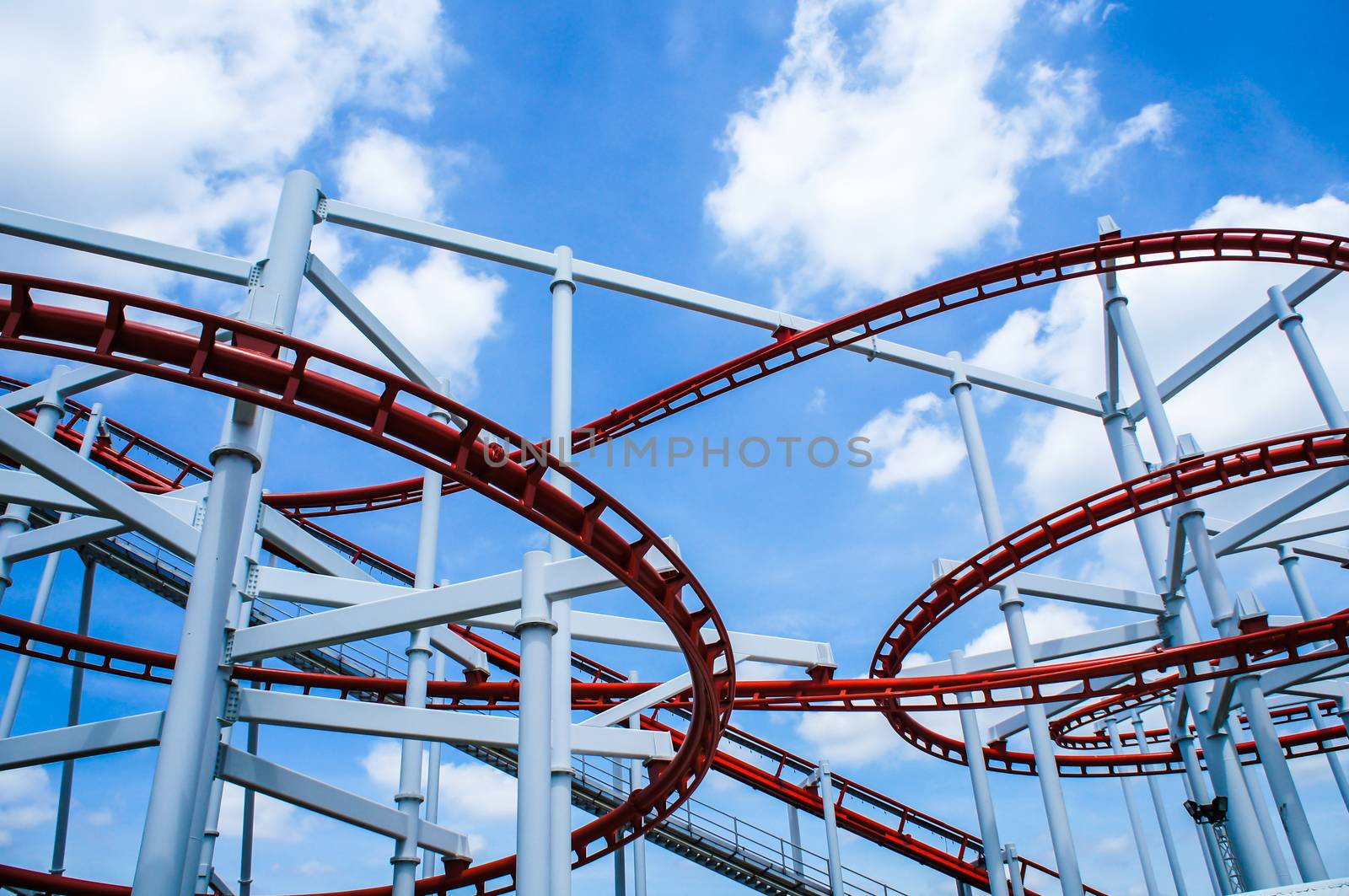 Rollercoaster ride with sky at theme park