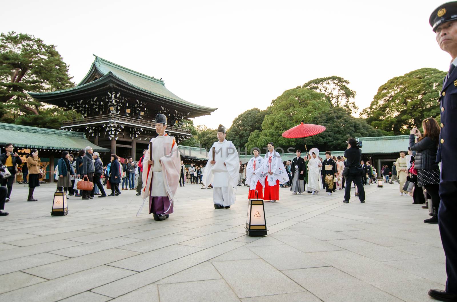 Tokyo, Japan - November 23, 2013: Japanese wedding ceremony at Shrine by siraanamwong