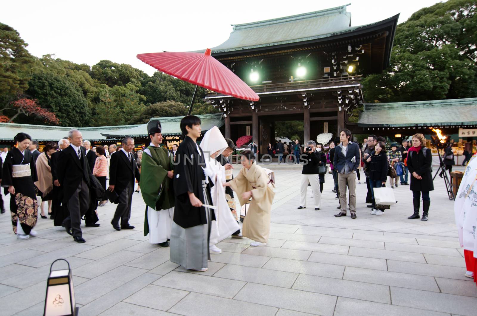 Tokyo, Japan - November 23, 2013: Japanese wedding ceremony at Meiji Jingu Shrine. by siraanamwong
