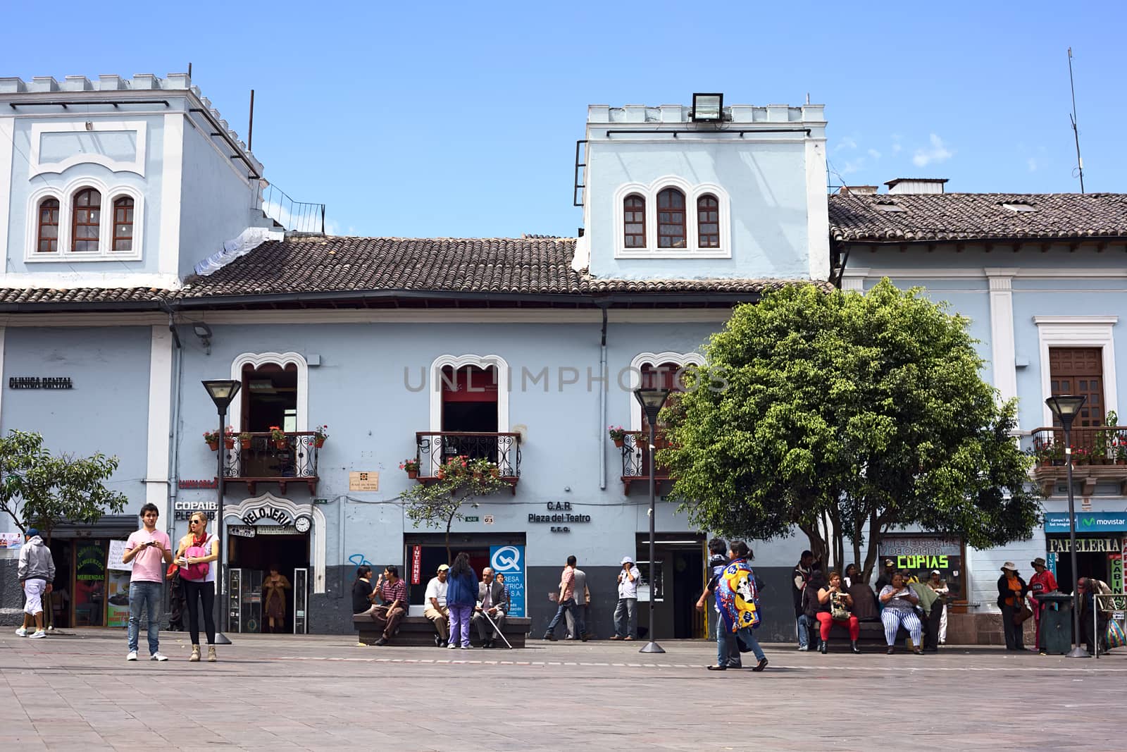 QUITO, ECUADOR - AUGUST 4, 2014: Unidentified people on Plaza del Teatro opposite the Sucre National Theater in the historic city center on August 4, 2014 in Quito, Ecuador. Quito is an UNESCO World Cultural Heritage Site. 