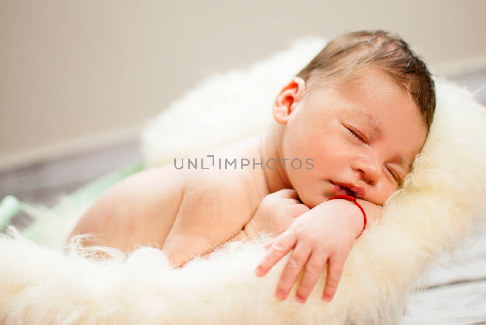 Little newborn caucasian baby boy 20 days