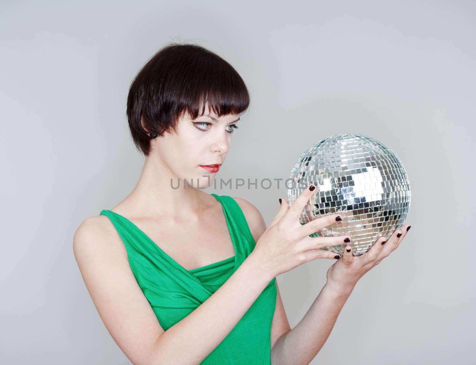 girlsholding a disco ball by courtyardpix