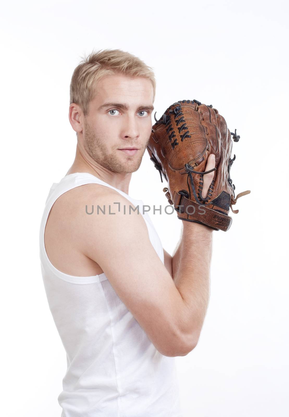 man in white top with baseball glove looking into camera - isolated on white