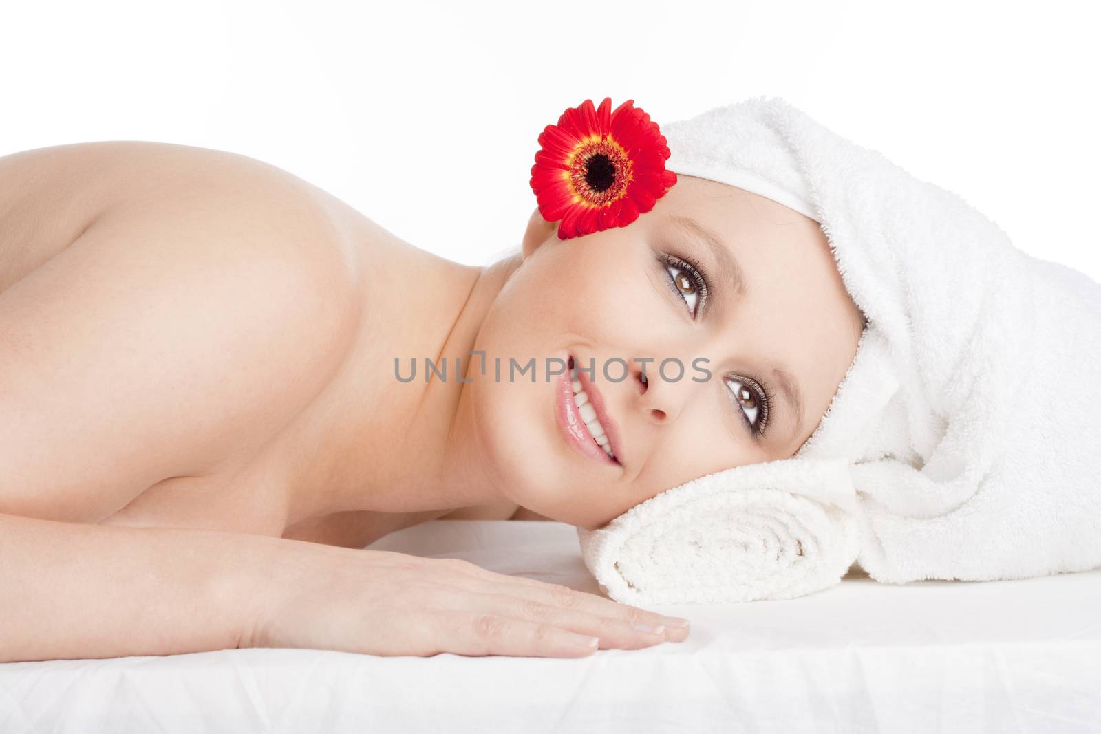 Young Woman in Spa Relaxing by courtyardpix